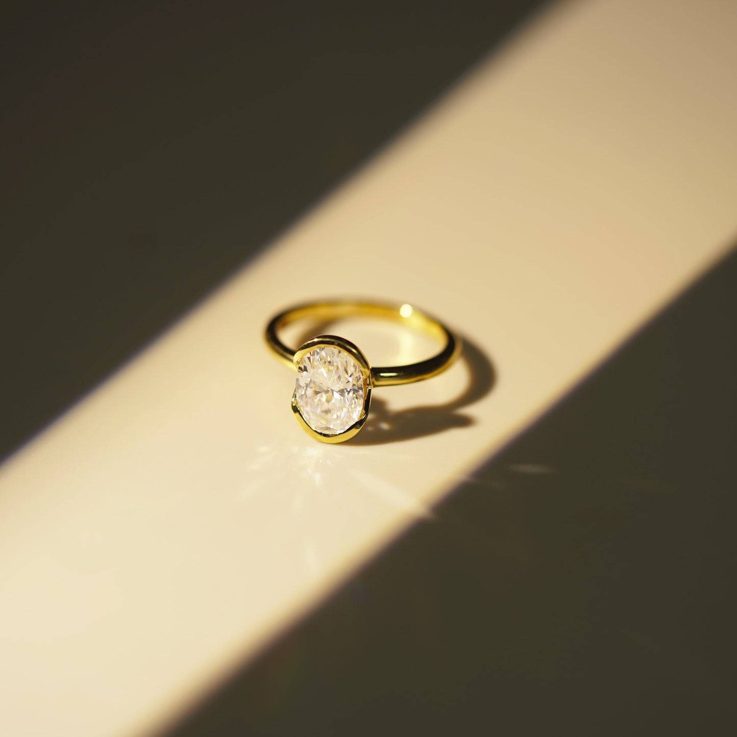 Oval Cut Half Bezel Lab-Grown Diamond Engagement Ring