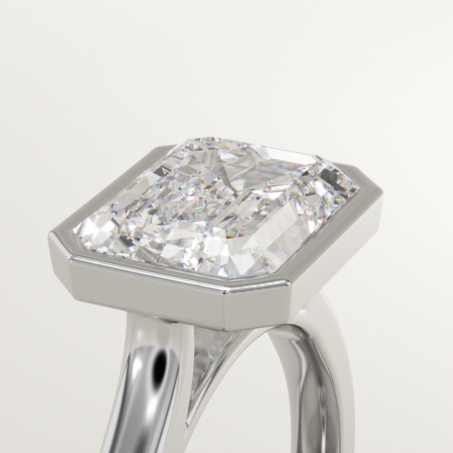 East West Emerald Cut Bezel Lab-Grown Diamond Engagement Ring