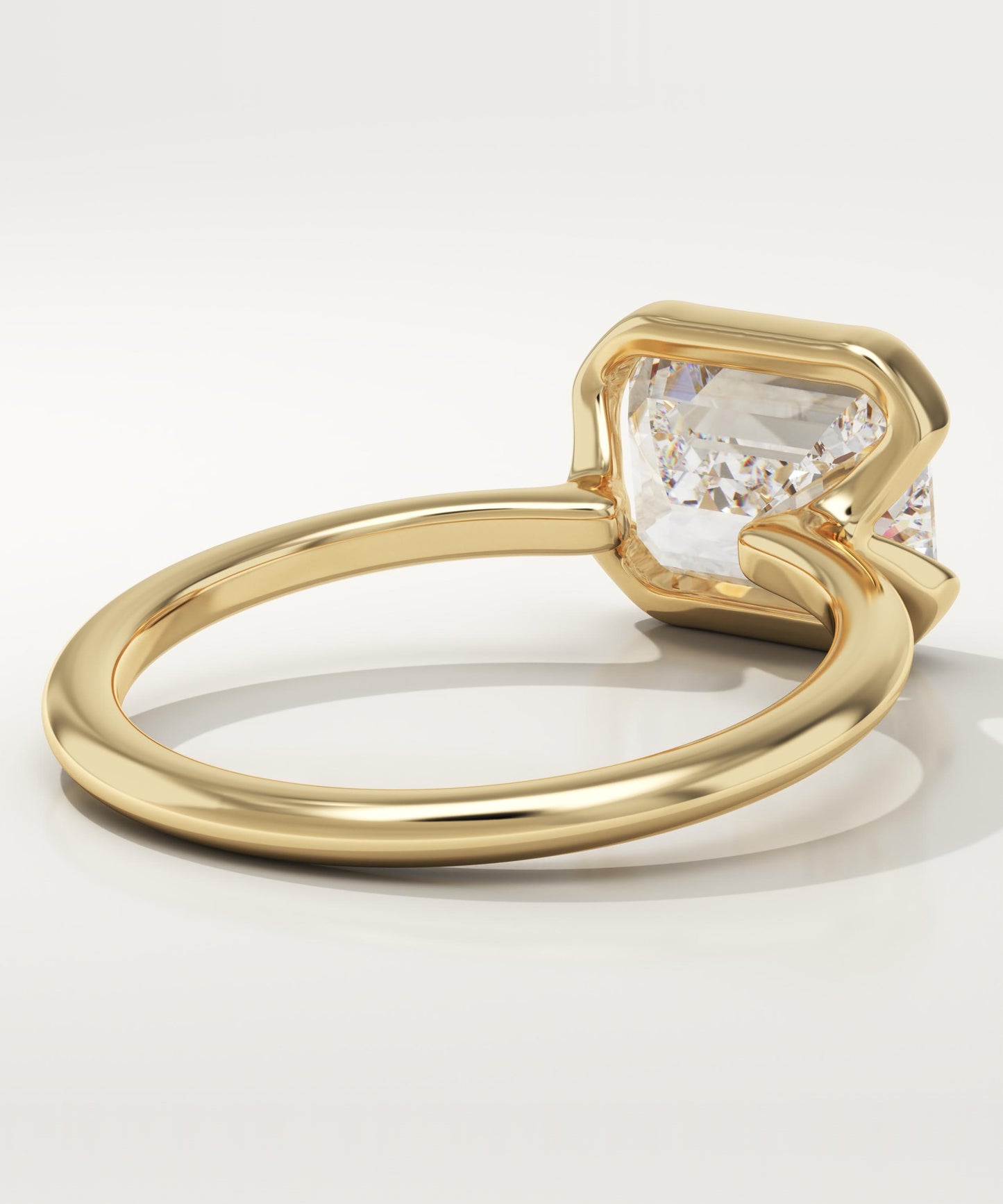 East West Emerald Cut Half Bezel Lab-Grown Diamond Engagement Ring