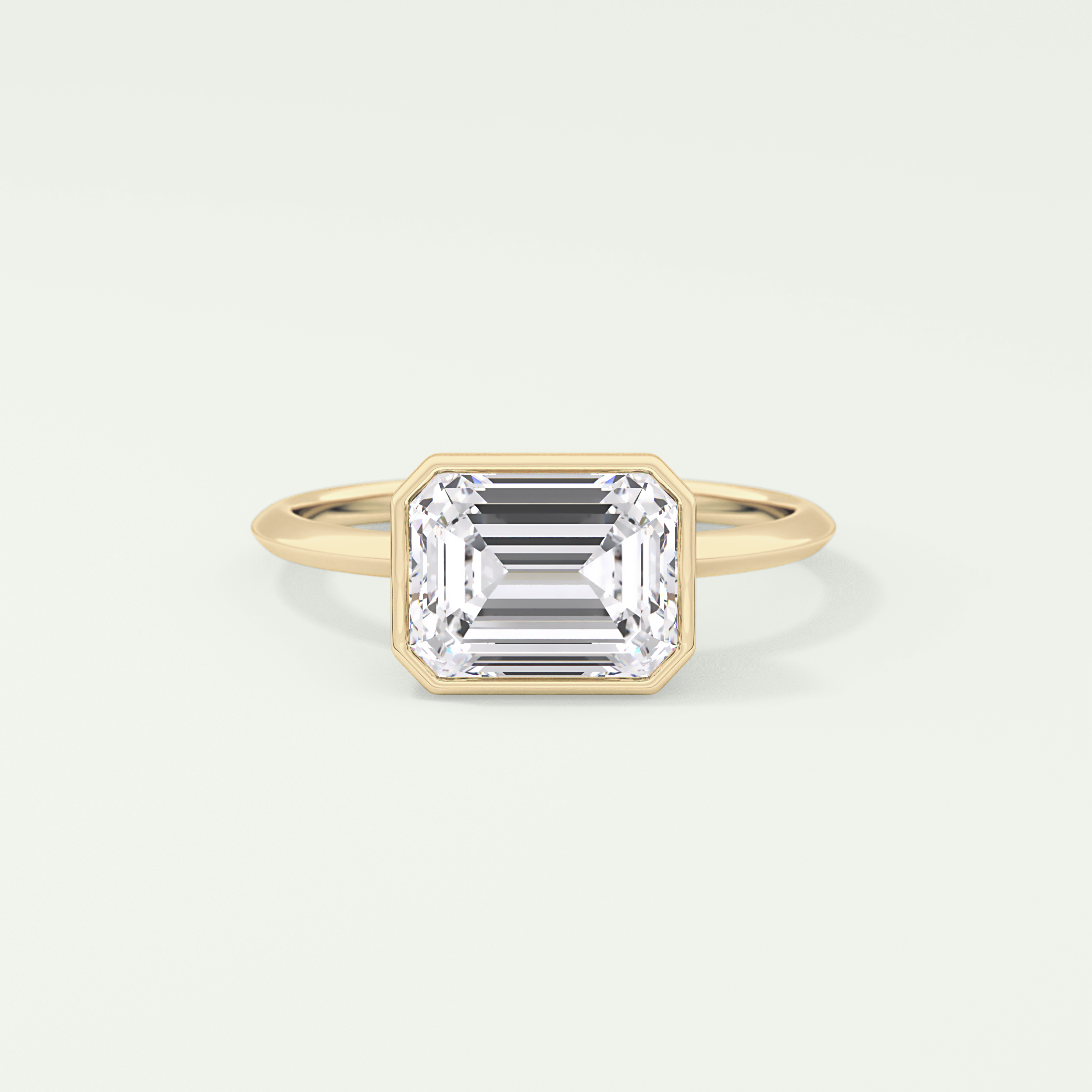 1.5 CT East West Emerald Cut Bezel Style Moissanite Engagement Ring
