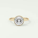 1.5 CT Round Cut Bezel Style Lab Grown Diamond Engagement Ring