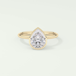 1.25 CT Pear Cut Bezel Style Lab Grown Diamond Engagement Ring