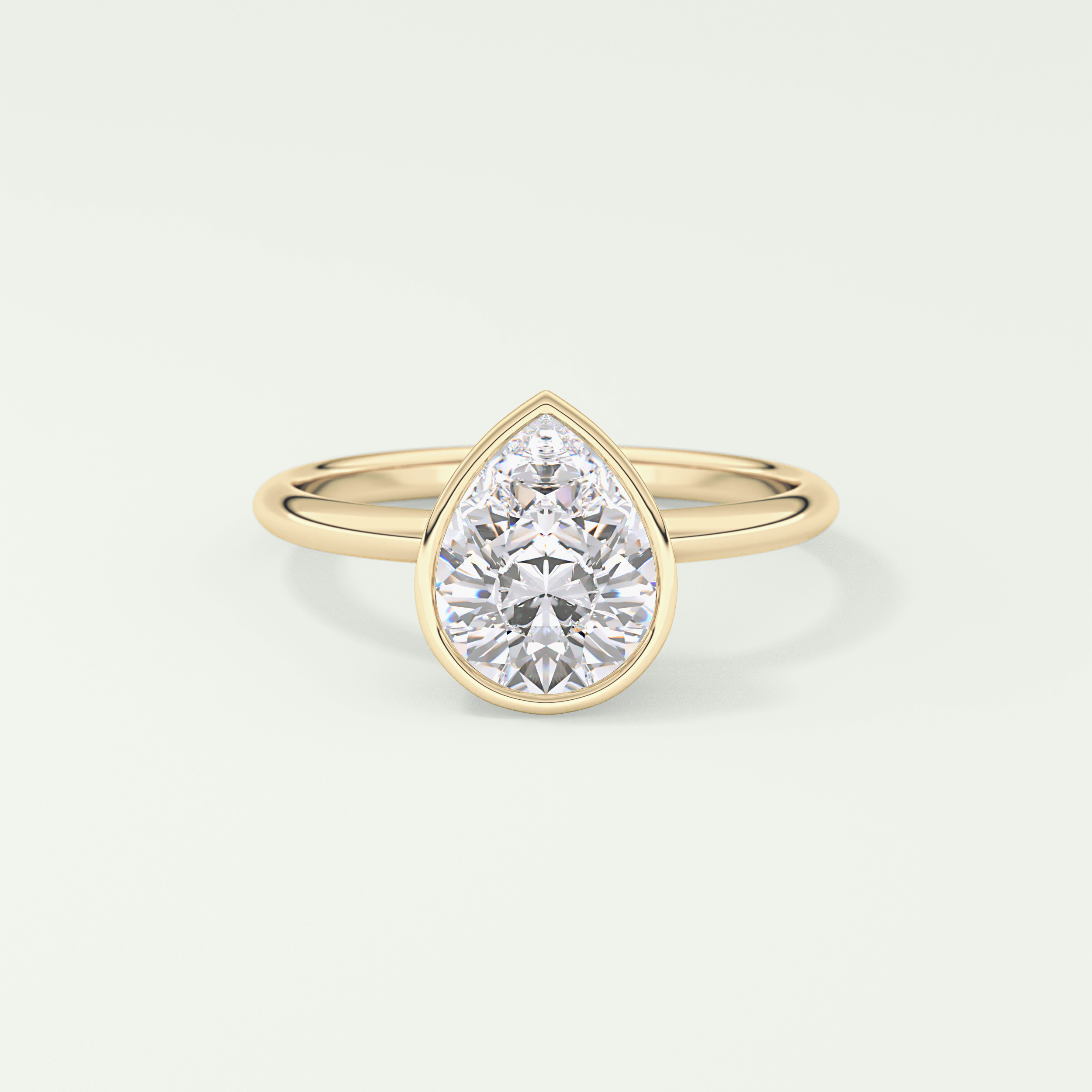1.25 CT Pear Cut Bezel Style Lab Grown Diamond Engagement Ring