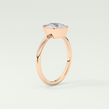 1.25 CT Pear Cut Bezel Style Lab Grown Diamond Engagement Ring