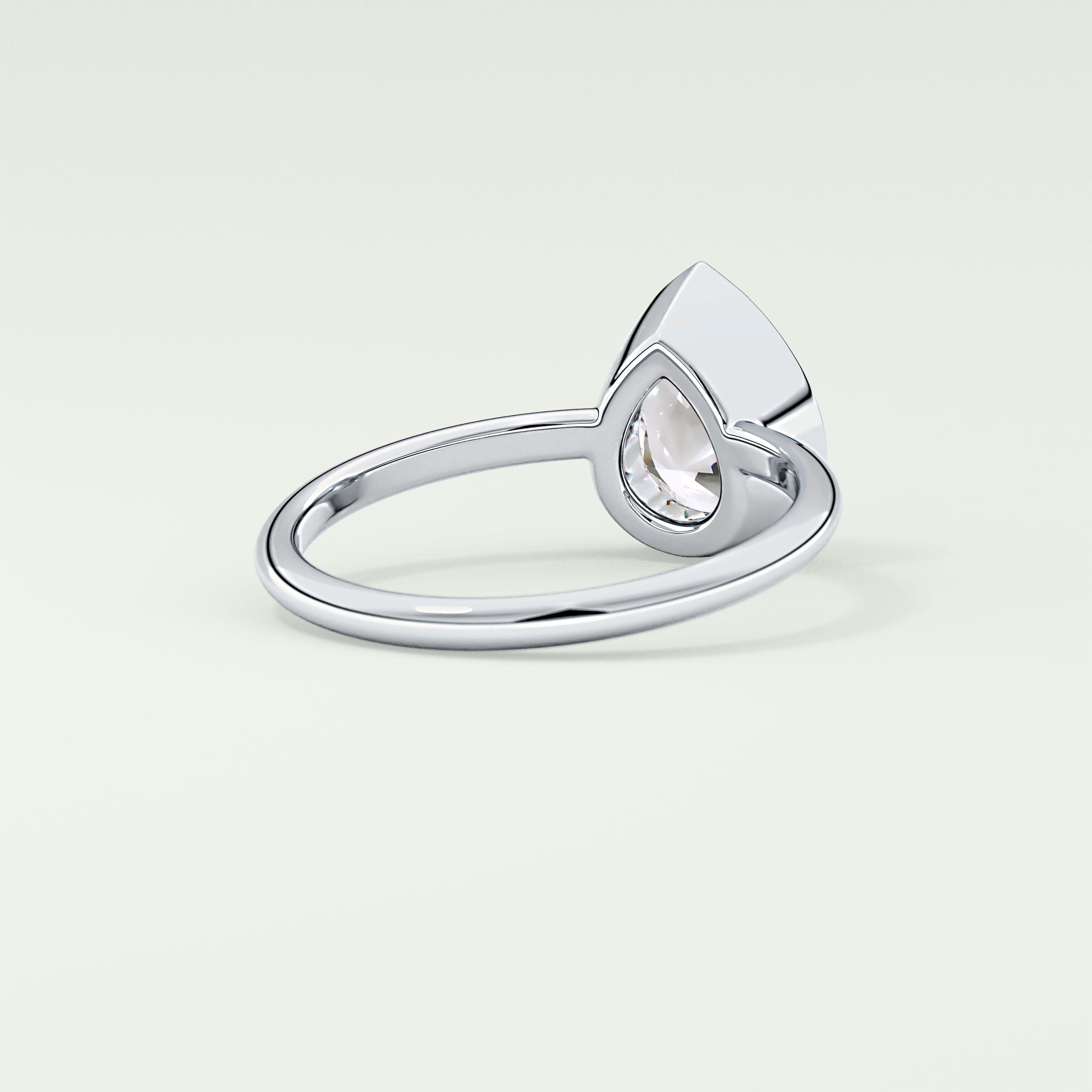 1.25 CT Pear Cut Bezel Style Lab Grown Diamond Engagement Ring