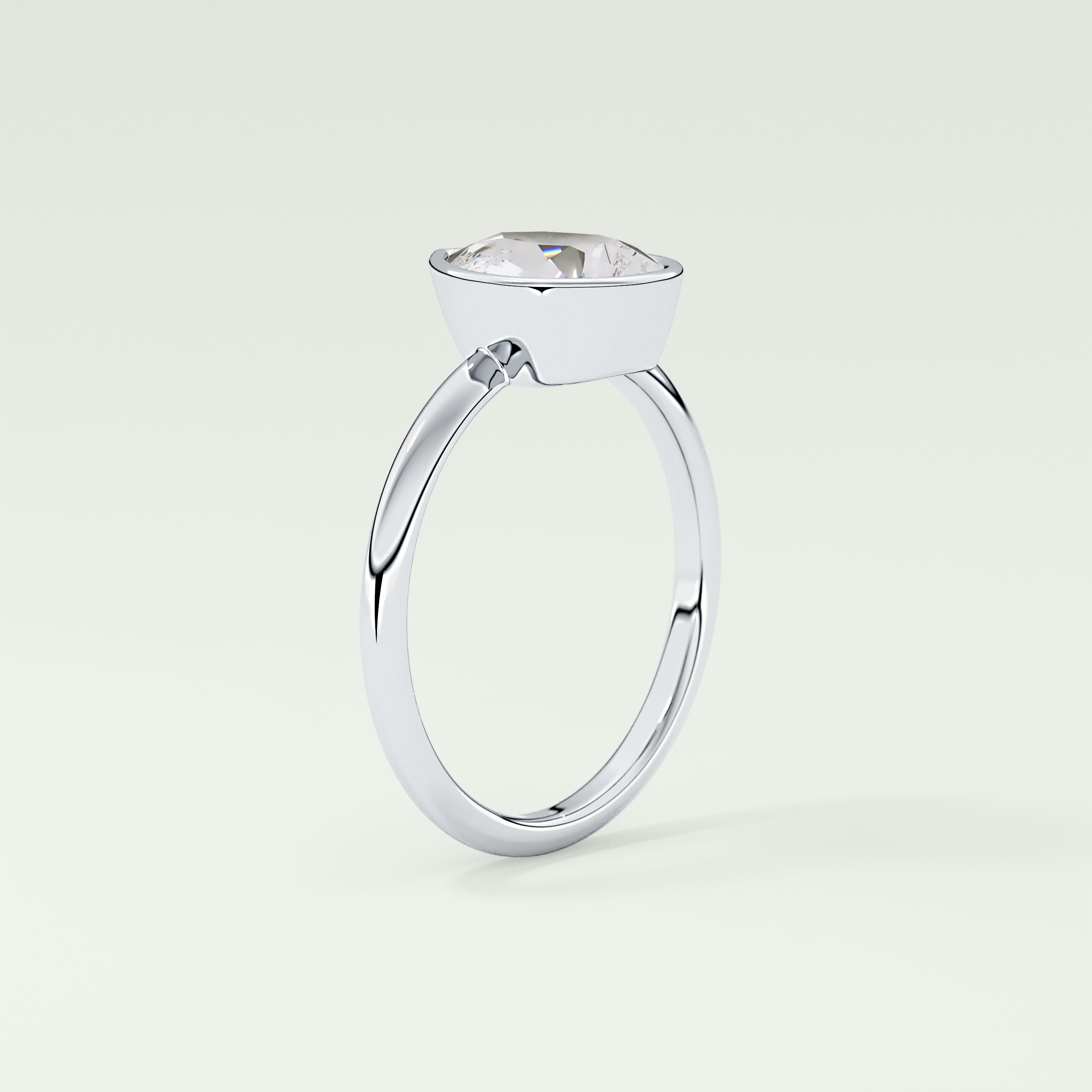 1.25 CT Pear Cut Bezel Style Lab Grown Diamond Engagement Ring
