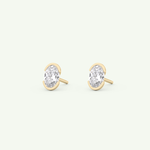 1 TCW Oval Cut Moissanite Half Bezel Stud Earrings in Gold