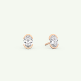 1 TCW Oval Cut Moissanite Half Bezel Stud Earrings in Gold