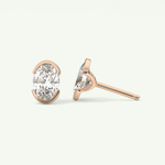 1 TCW Oval Cut Moissanite Half Bezel Stud Earrings in Gold