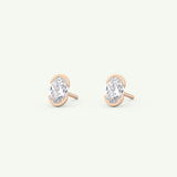 1 TCW Oval Cut Moissanite Half Bezel Stud Earrings in Gold