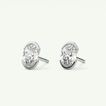 1 TCW Oval Cut Moissanite Half Bezel Stud Earrings in Gold
