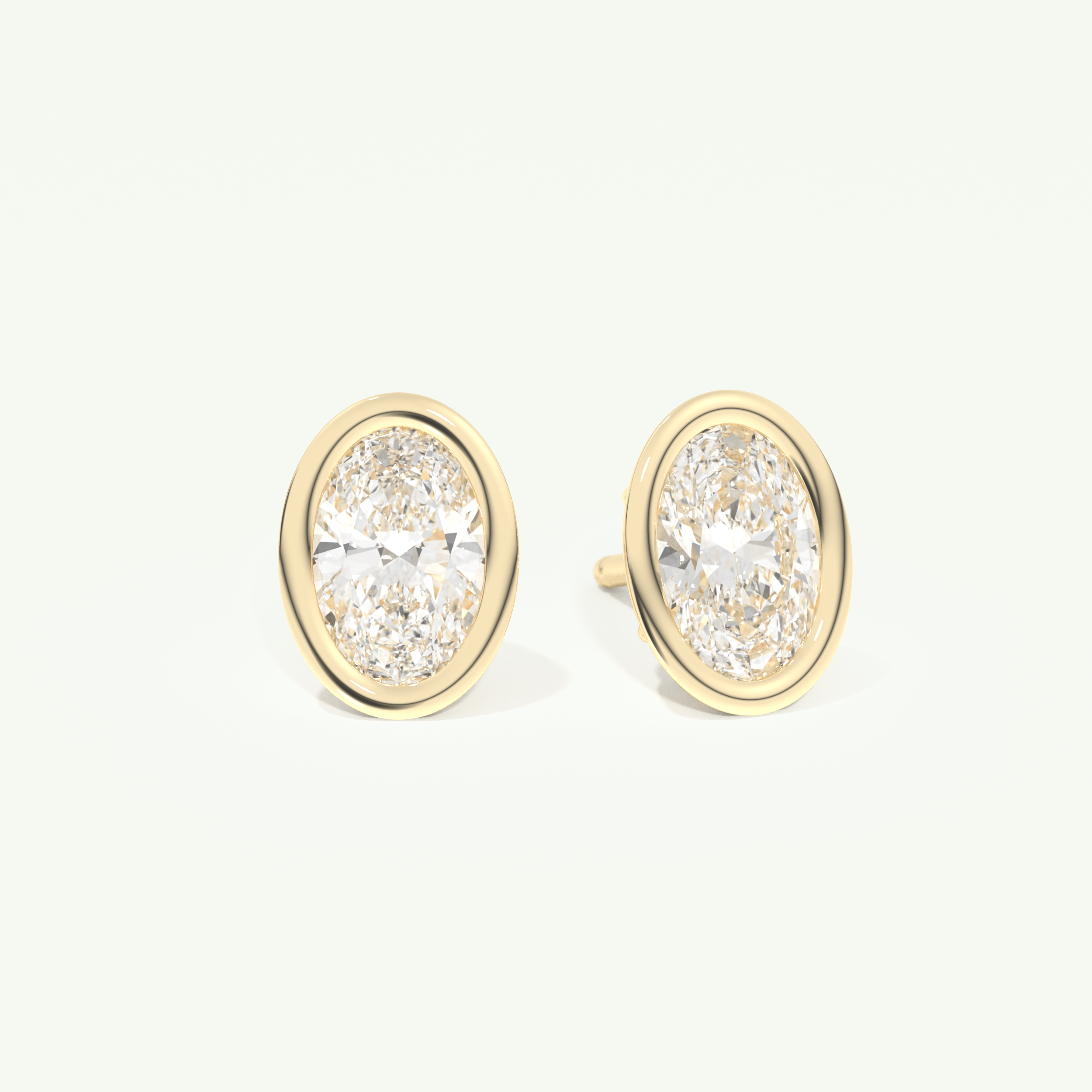 1 TCW Oval Cut Moissanite Bezel Stud Earrings in Gold