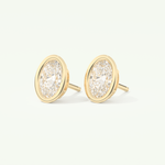 1 TCW Oval Cut Moissanite Bezel Stud Earrings in Gold
