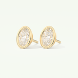 1 TCW Oval Cut Moissanite Bezel Stud Earrings in Gold