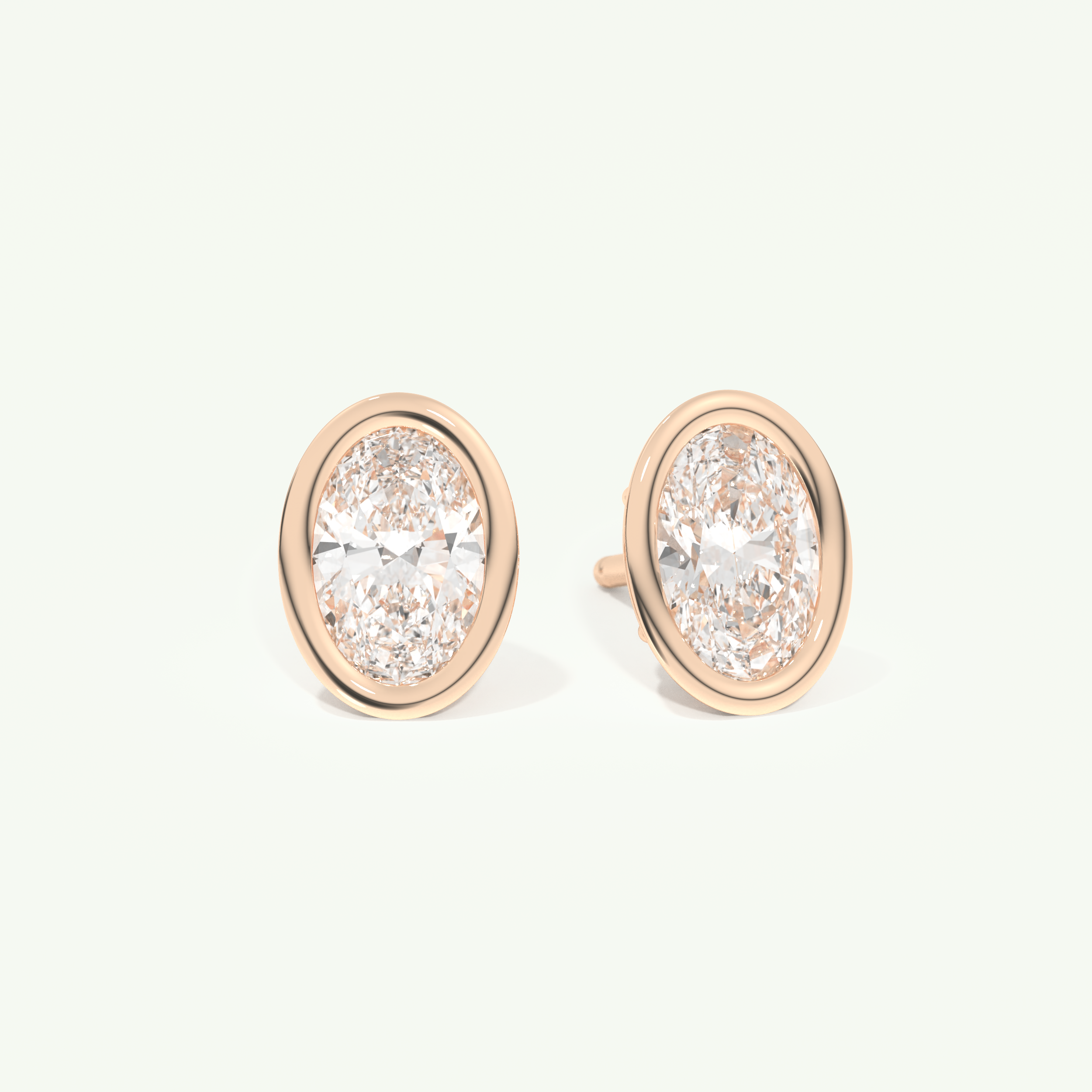 1 TCW Oval Cut Moissanite Bezel Stud Earrings in Gold