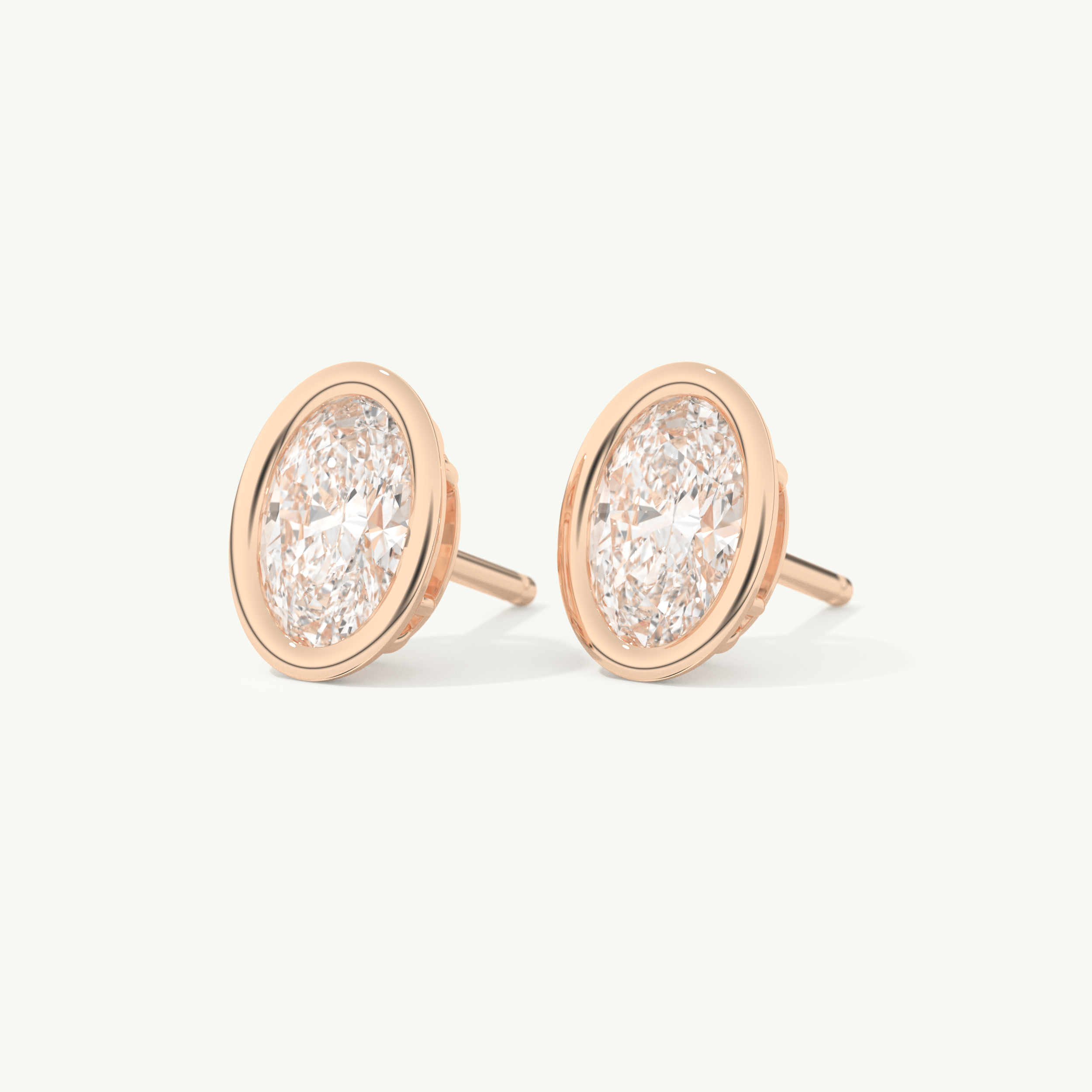 1 TCW Oval Cut Moissanite Bezel Stud Earrings in Gold