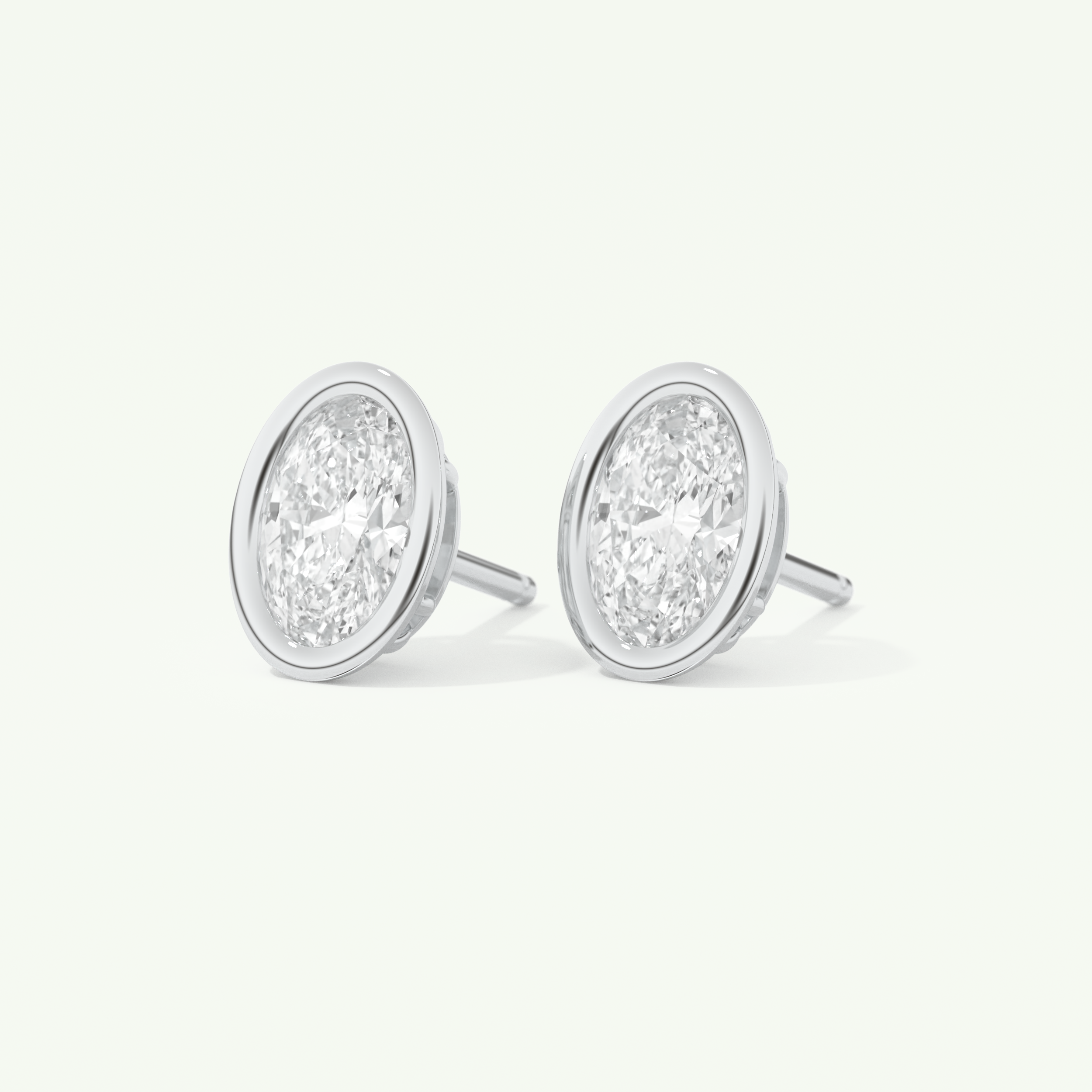 1 TCW Oval Cut Moissanite Bezel Stud Earrings in Gold