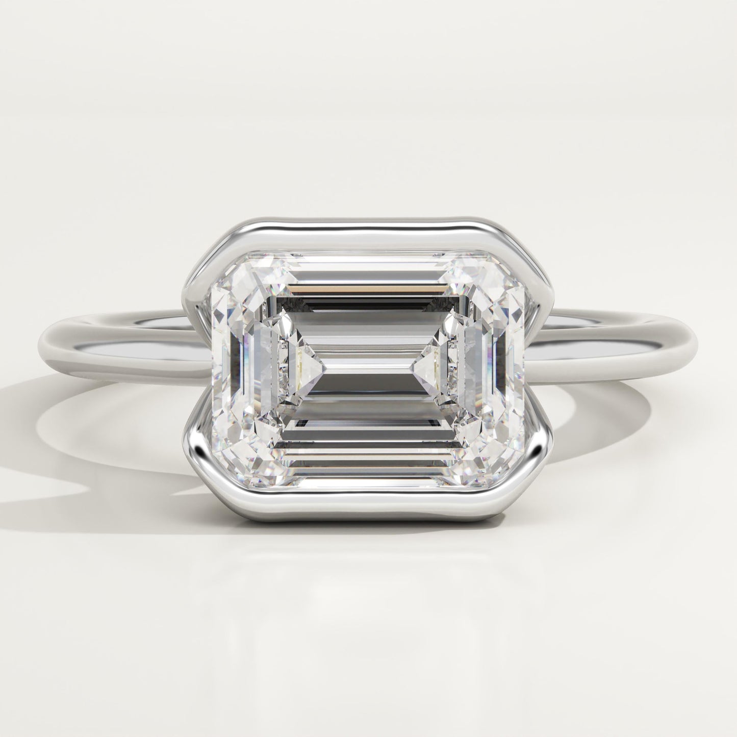 East West Emerald Cut Half Bezel Lab-Grown Diamond Engagement Ring