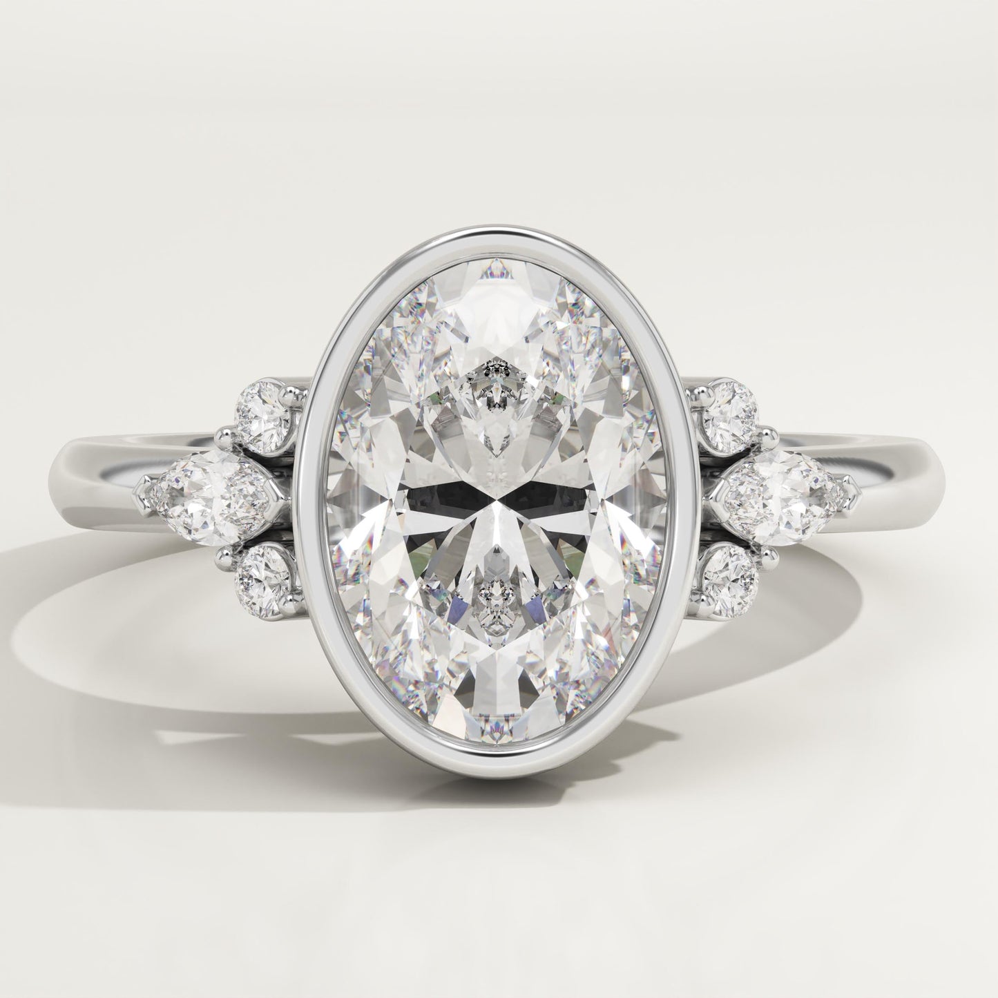 Oval Cut Bezel & Cluster Lab-Grown Diamond Engagement Ring
