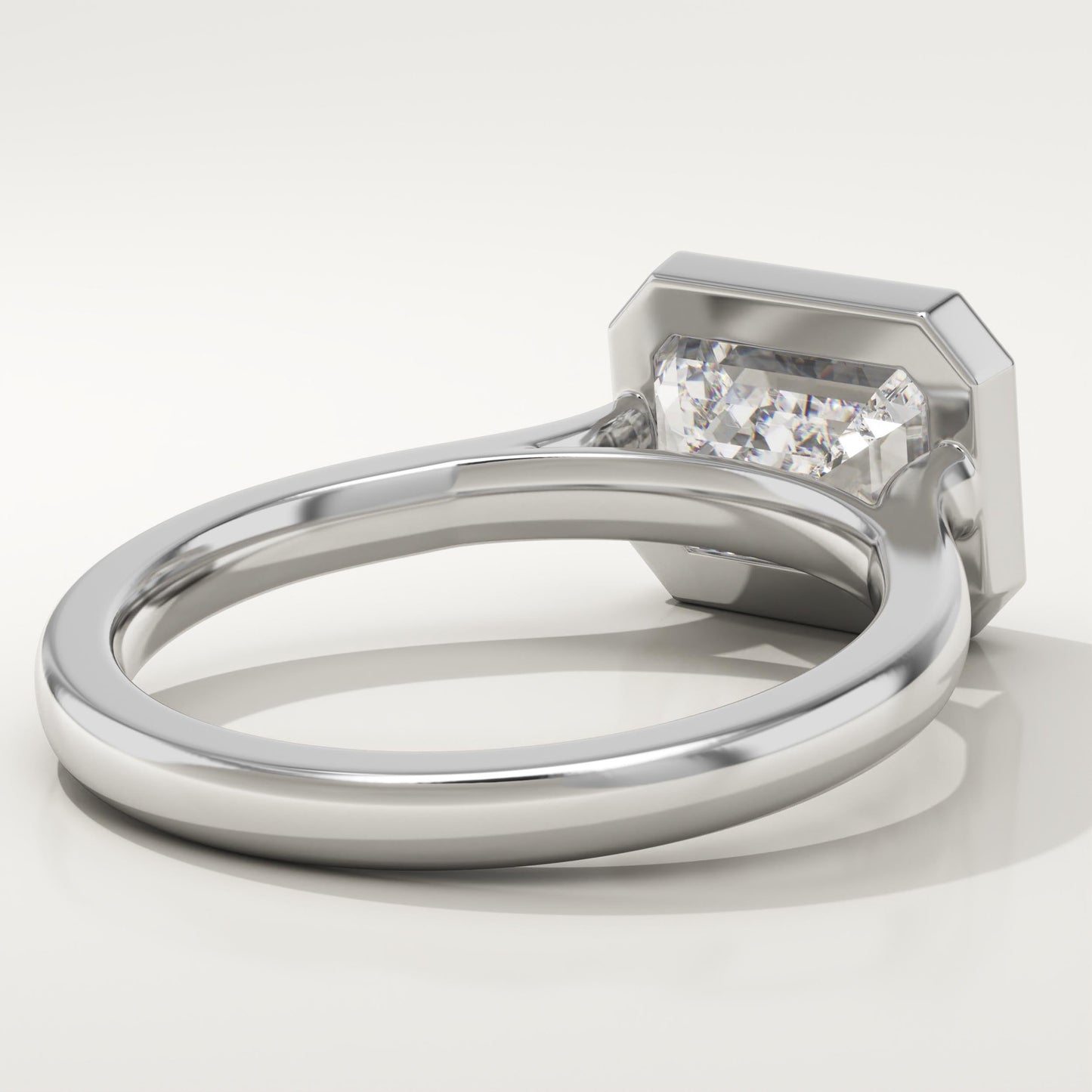 East West Emerald Cut Bezel Lab-Grown Diamond Engagement Ring