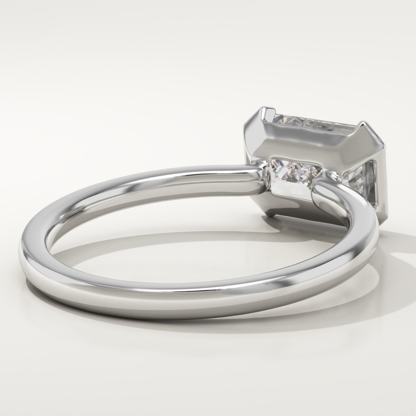 East West Emerald Cut Half Bezel Lab-Grown Diamond Engagement Ring