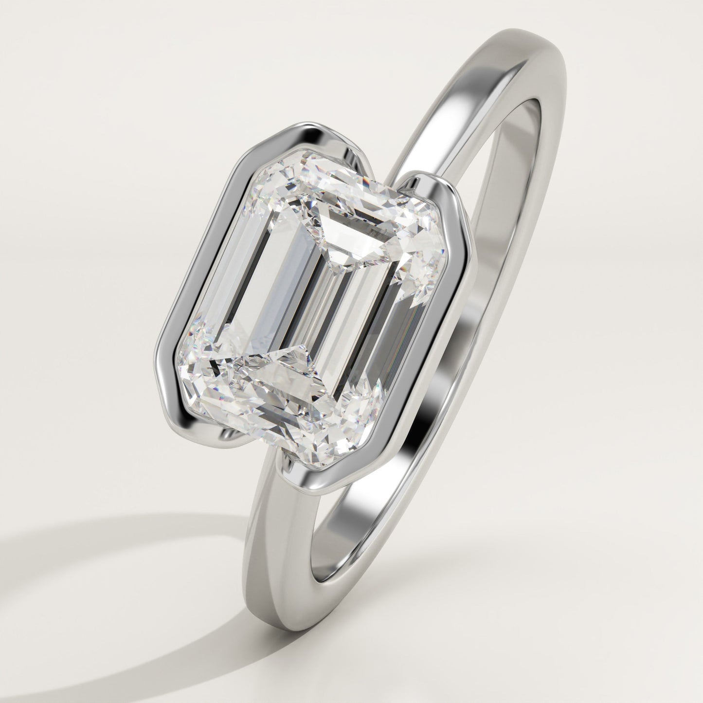 East West Emerald Cut Half Bezel Lab-Grown Diamond Engagement Ring