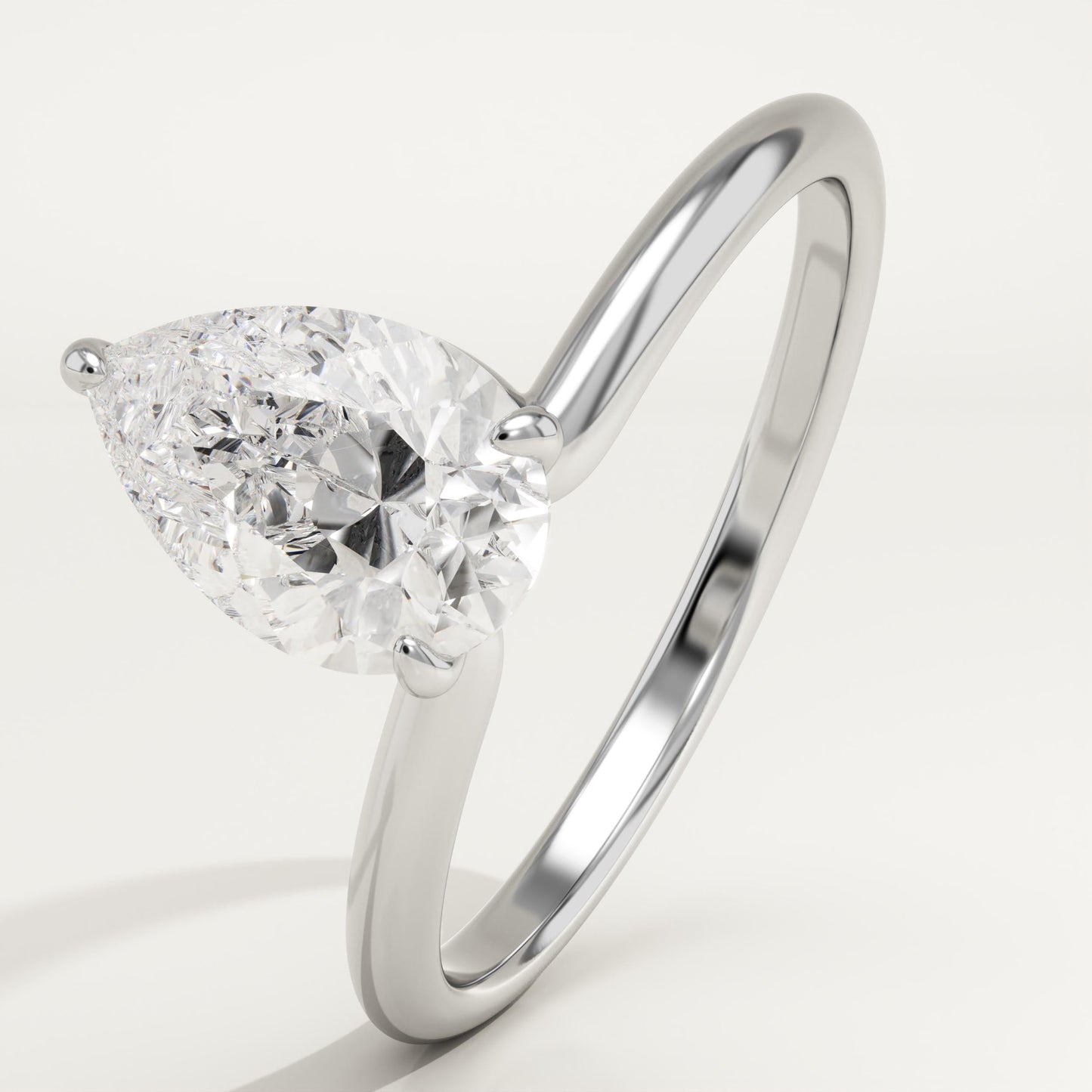 1.25 CT Pear Cut Solitaire Moissanite Engagement Ring
