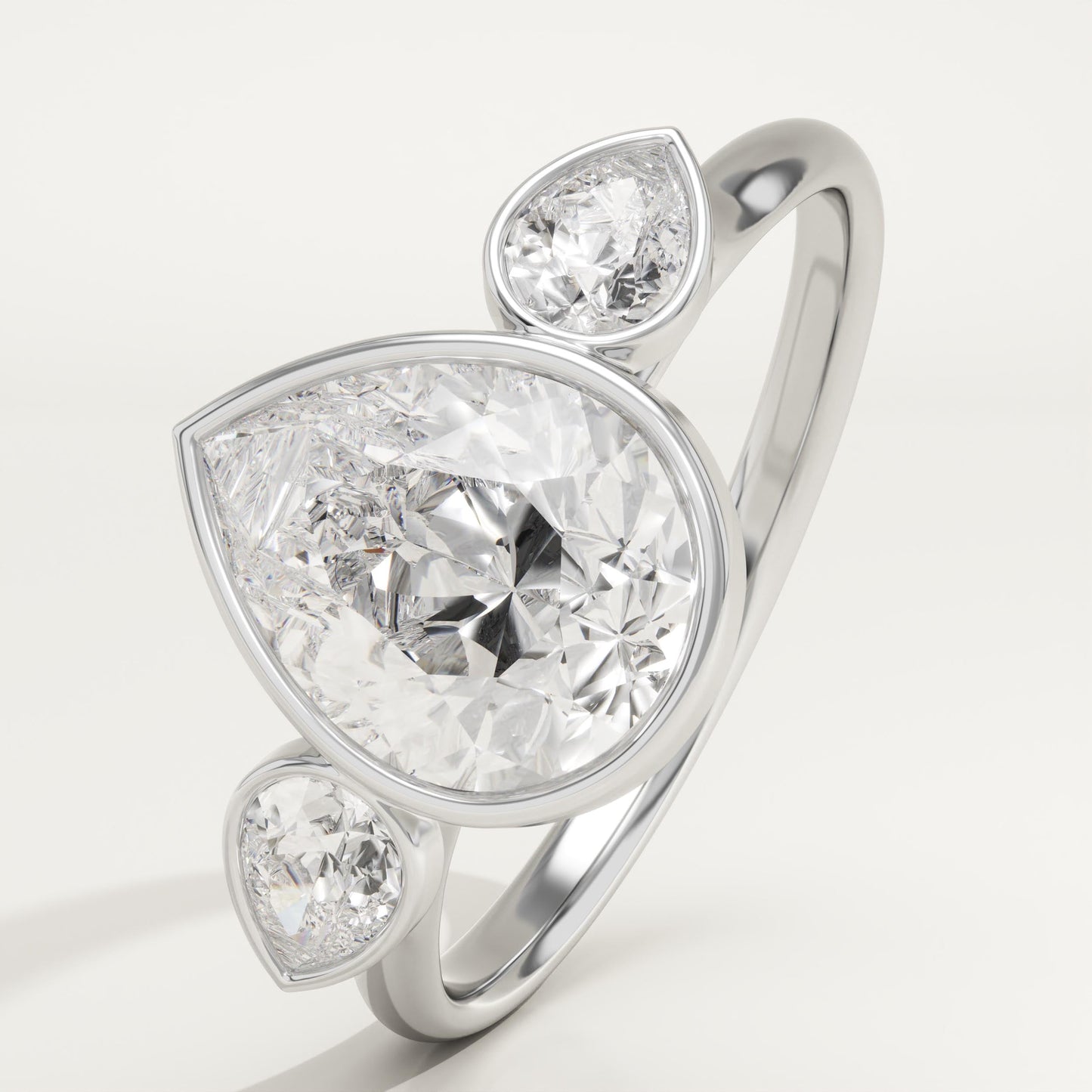 1.5 CT Pear Cut Three Stone Bezel Moissanite Engagement Ring