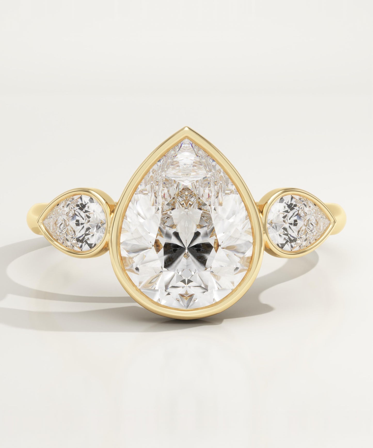 1.5 CT Pear Cut Three Stone Bezel Moissanite Engagement Ring