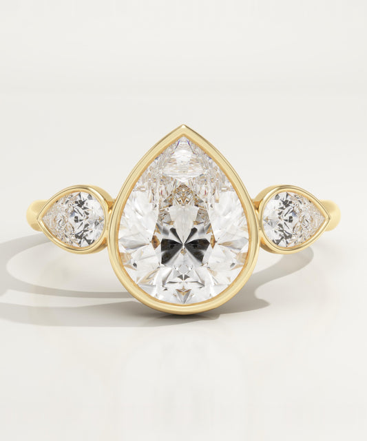 1.5 CT Pear Cut Three Stone Bezel Moissanite Engagement Ring