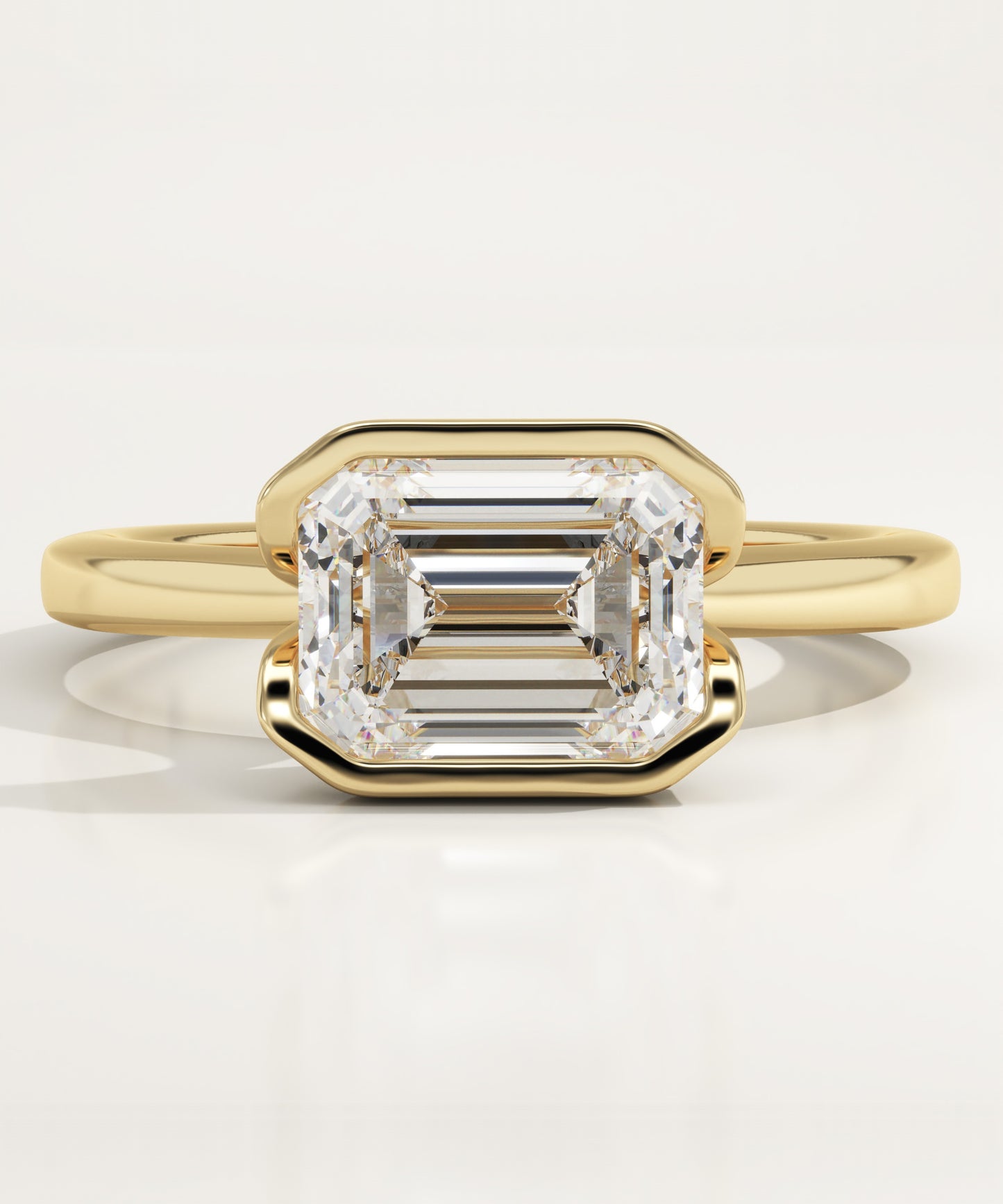 East West Emerald Cut Half Bezel Lab-Grown Diamond Engagement Ring