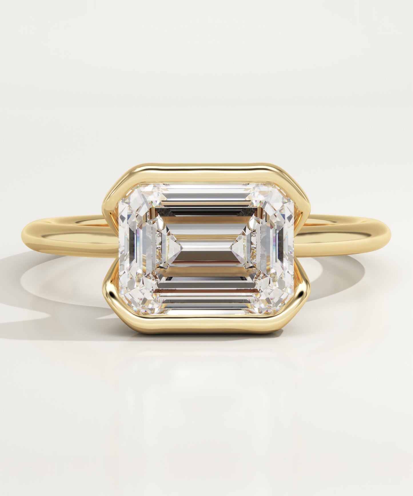 East West Emerald Cut Half Bezel Lab-Grown Diamond Engagement Ring