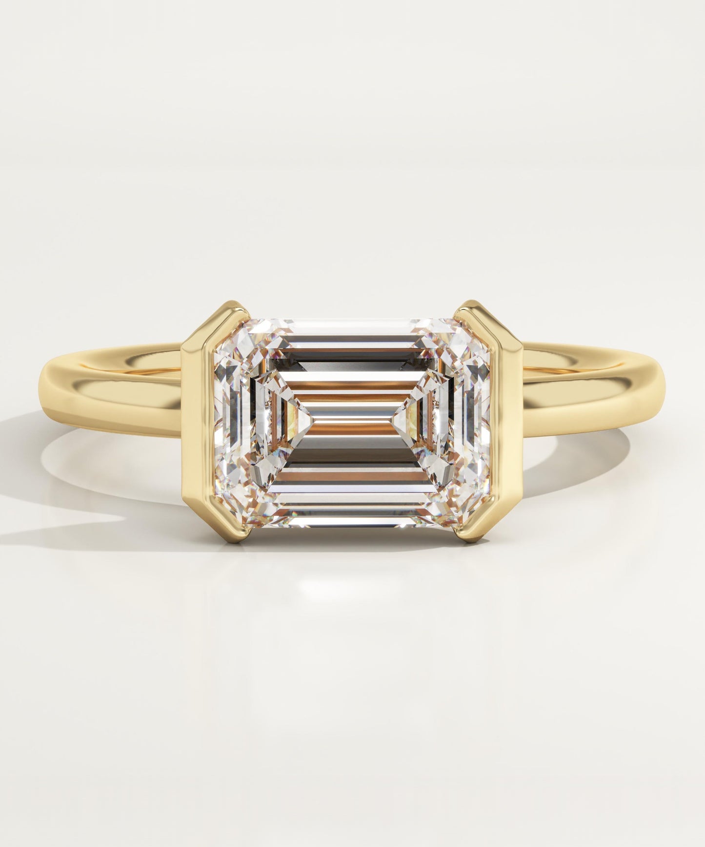 East West Emerald Cut Half Bezel Lab-Grown Diamond Engagement Ring