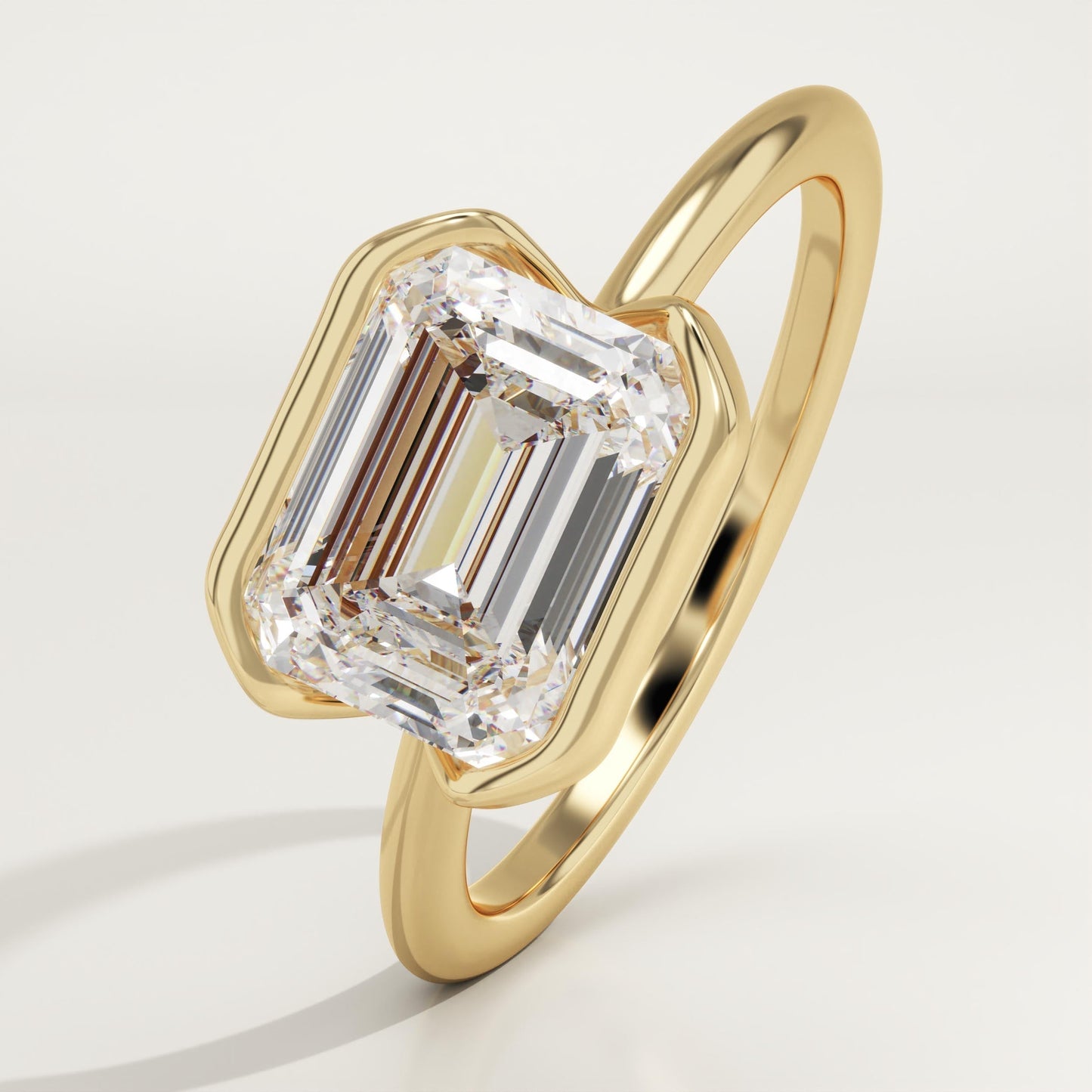 East West Emerald Cut Half Bezel Lab-Grown Diamond Engagement Ring