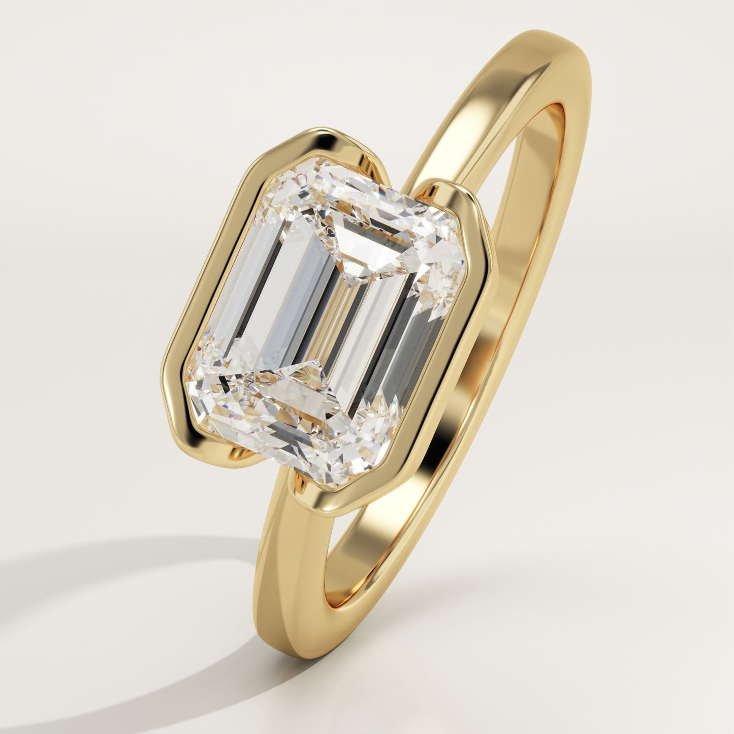 East West Emerald Cut Half Bezel Lab-Grown Diamond Engagement Ring
