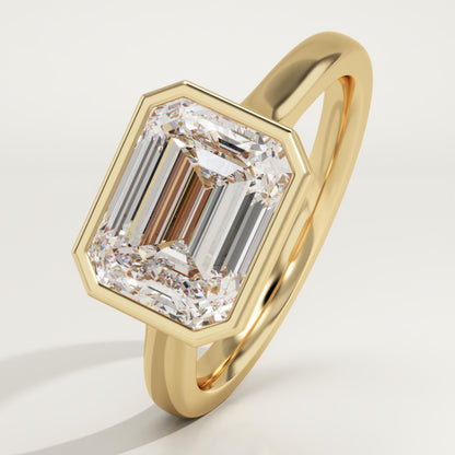 East West Emerald Cut Bezel Lab-Grown Diamond Engagement Ring