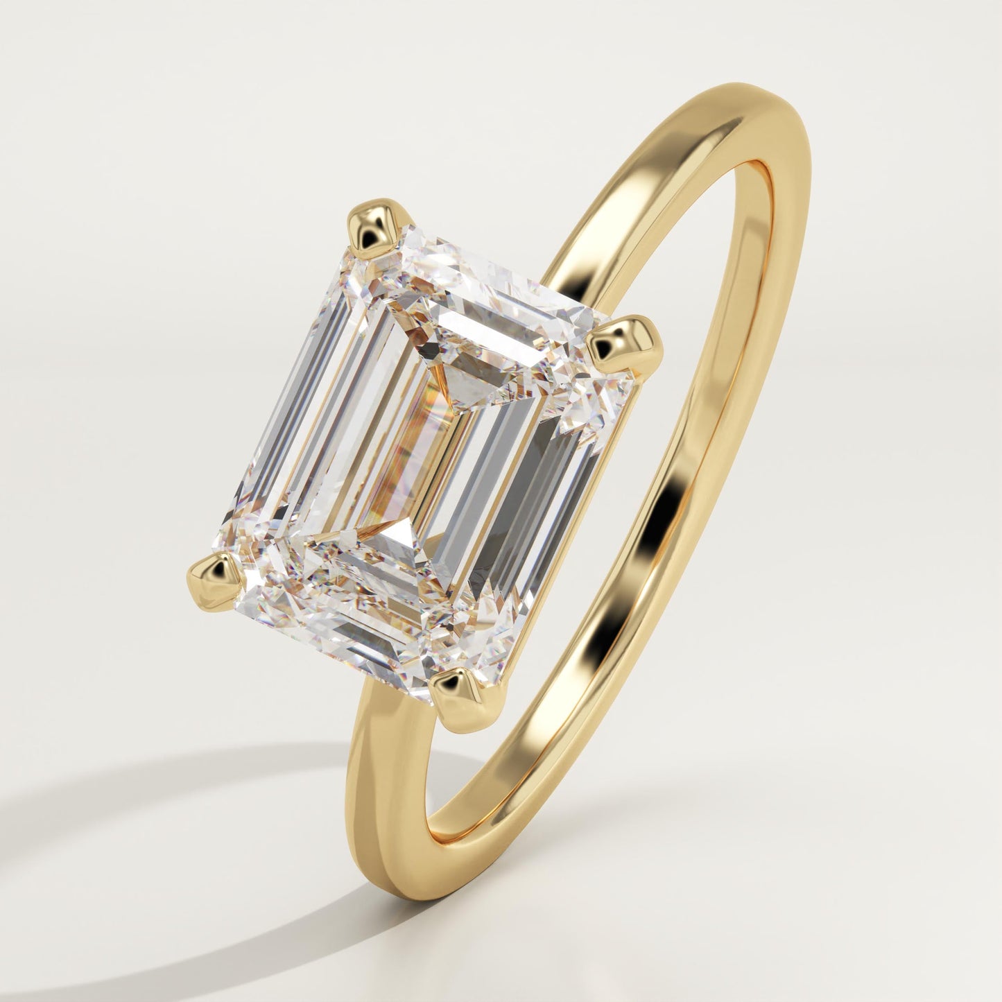 East-West Emerald Cut Solitaire Lab-Grown Diamond Engagement Ring