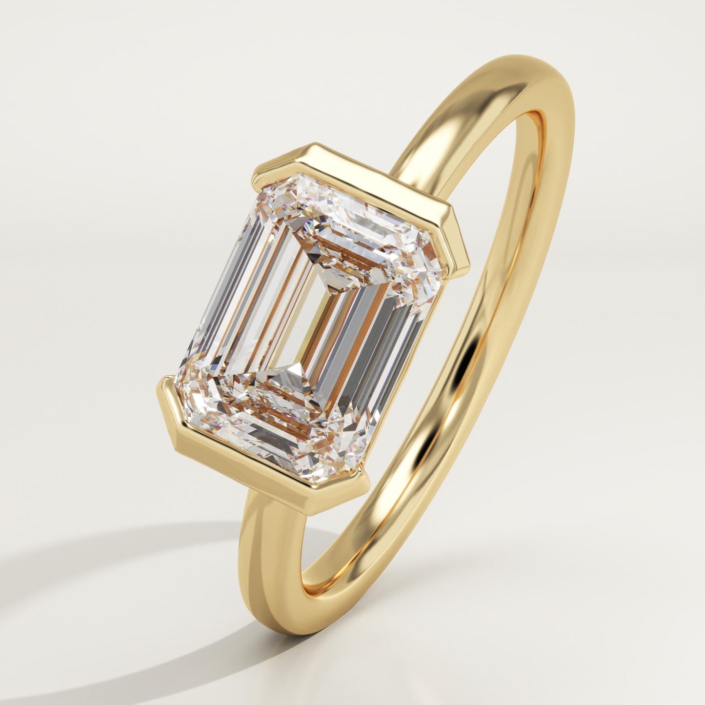 East West Emerald Cut Half Bezel Lab-Grown Diamond Engagement Ring