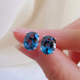 6.01 TCW Oval December-Blue Topaz Birthstone Stud Earrings